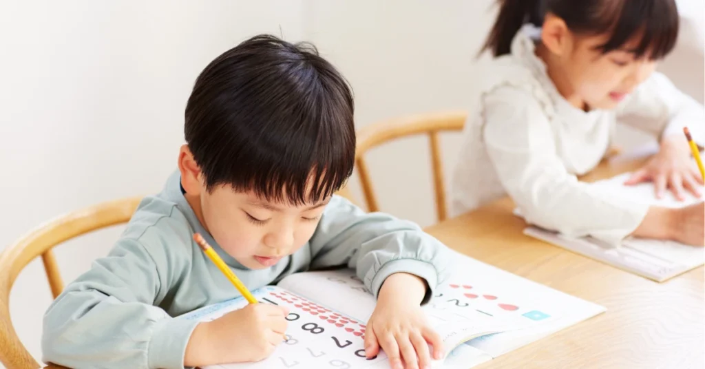 Child completing psychoeducational testing assessment with focused concentration during educational evaluation